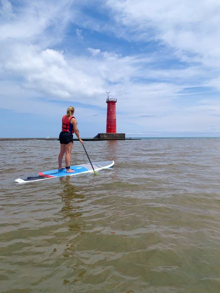 Stand up paddleboarding Sheboygan Wisconsin lighthouse