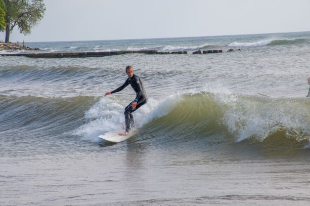 Surfing wave Sheboygan Wisconsin