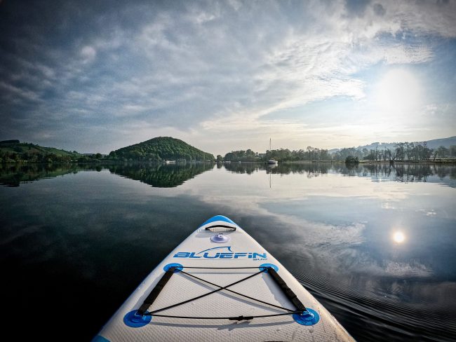 Bluefin cruise inflatable sup with tie downs nose on water photo Guiseppe