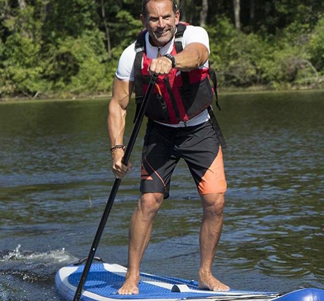 Coach Jeffrey Morrison stand up paddling fitness